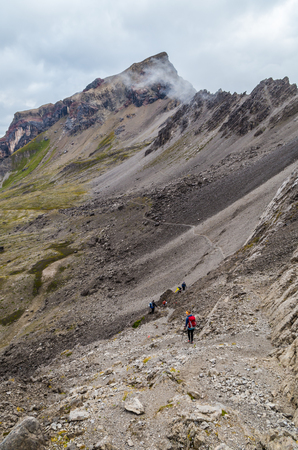 Group of mountaineers hiking in beautiful mountain landscape in the Lechtal Alps, North Tyrol, Austriaの写真素材