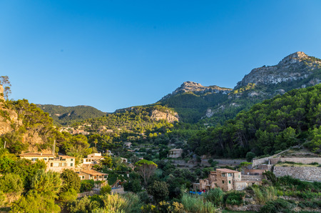Beautiful panorama of the town Estellencs in the mountains of Tramuntana on Mallorca, Spainの写真素材