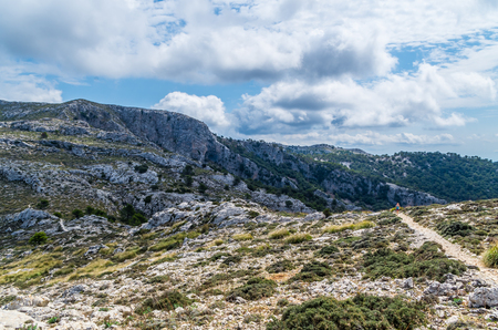 Female hiking in the mountains of Tramuntana, Mallorca, Balearic Islands, Spainの写真素材