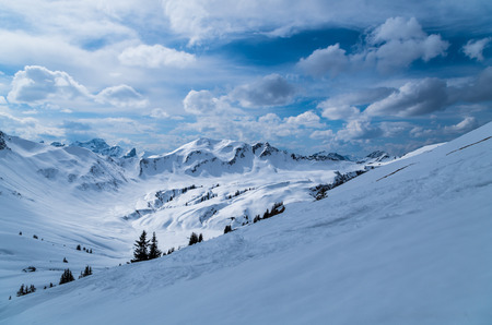 Ski touring track in beautiful sunny winter landscape, Kleinwalsertal, Austriaの写真素材