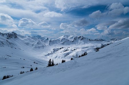 Ski touring track in beautiful sunny winter landscape, Kleinwalsertal, Austriaの写真素材