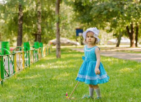 little girl walk in the parkの写真素材