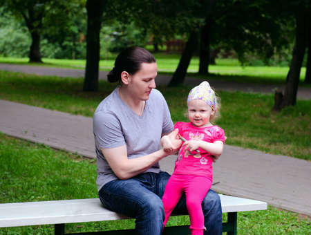 Father and daughter walk Parkの写真素材
