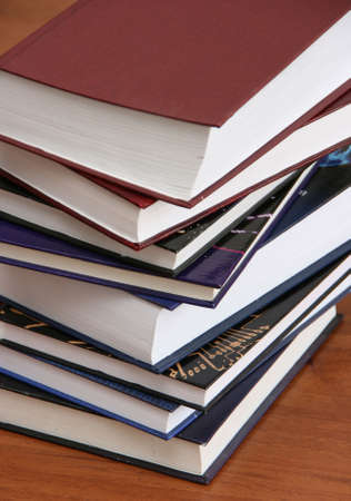 Stack of new books with hard cover spines