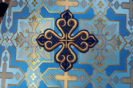 Holy Cross on blue solemn slavic orthodox priest's mantle