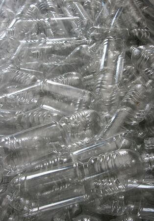 Background of transparent plastic bottles pileの写真素材