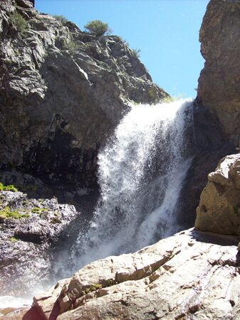 Waterfall at the top of a hike in a canyon の写真素材