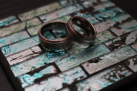 Two titanium wedding bands togetherの写真素材