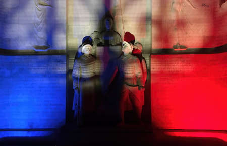 The colors of France on statue of veterans in night blue red white rating for celebration of the end the warのeditorial素材