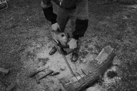 Choping wood in the backyardの写真素材