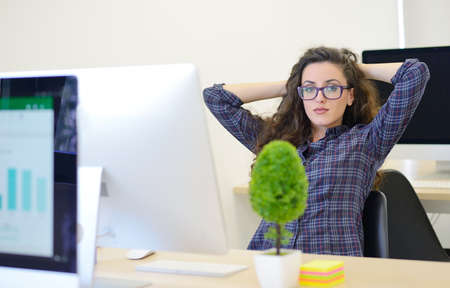 businesswoman resting at work. modern startup office