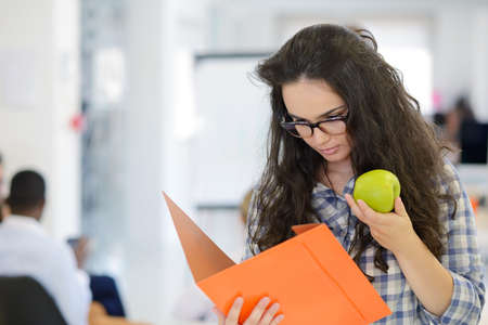 group of young business people having fun, relaxing and working in creative room space at modern startup officeの写真素材