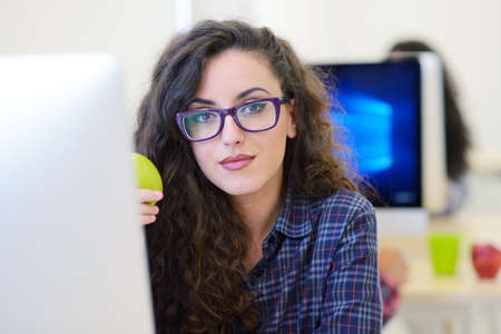 startup business, software developer working on computer at modern office
