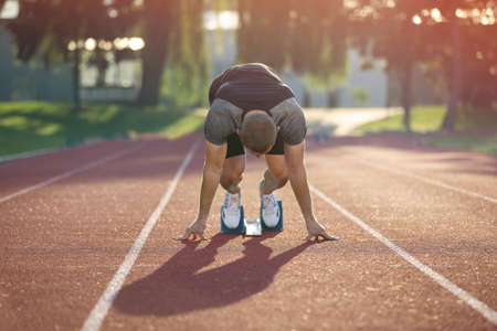 Track runner in starting position.の写真素材