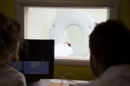 scientist Scanning the brains of patients with a Ct scanの写真素材