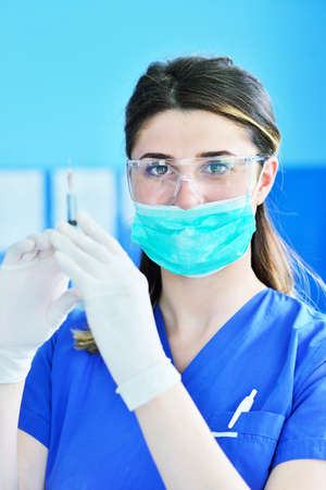 Woman having an injectionの写真素材