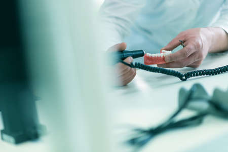 Dental prosthesis, dentures, prosthetics work. Dental students while working on the denture, false...