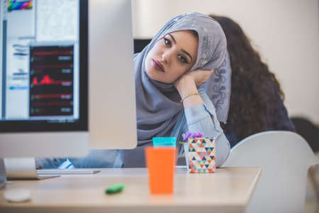 young middle eastern businesswoman working in officeの写真素材