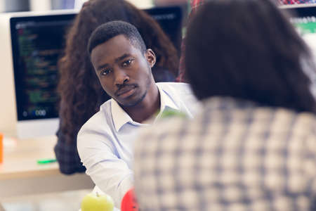 Group of multi ethnic business people at work, small business entrepreneur concept