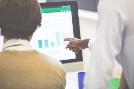 Young Businessman Analyzing Financial Chartの写真素材