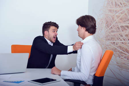 Two angry business colleagues during an argument.の写真素材