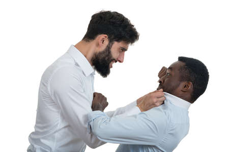 Closeup portrait of two grown mad men arguing, isolated on white background. Negative emotion facial...