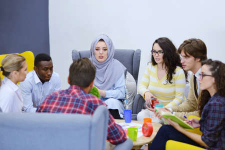 group of young business people, Startup entrepreneurs working on their venture in coworking spaceの写真素材