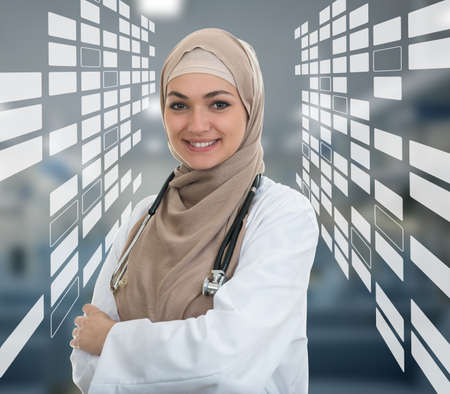 Closeup portrait of friendly, smiling confident muslim female doctorの写真素材