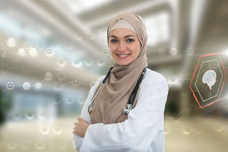 Closeup portrait of friendly, smiling confident muslim female doctorの写真素材