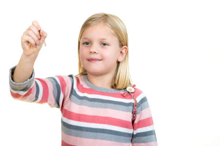 education, school and imaginary screen concept - cute little girl drawing in the air or imaginary...