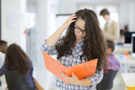 group of young business people having fun, relaxing and working in creative room spaceの写真素材