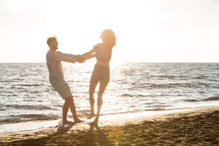 happiness and romantic Scene of love couples partners on the Beachの写真素材