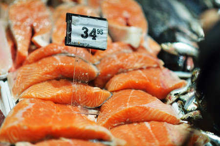 Seafood on ice at the fish marketの写真素材