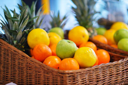 Fresh Tropical fruit basket in supermarketの写真素材