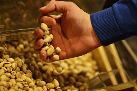 pistachios on the counter of a grocery market