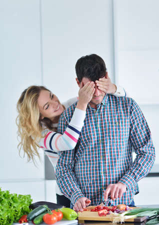 couple cooking healthy food in kitchen lifestyle meal preparationの写真素材