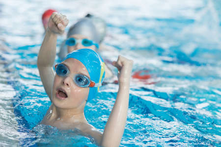 young and successful swimmers poseの写真素材