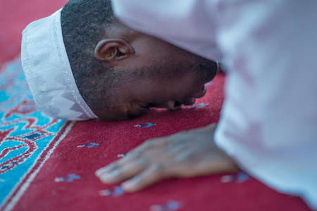 African Muslim Man Praying To Godの写真素材