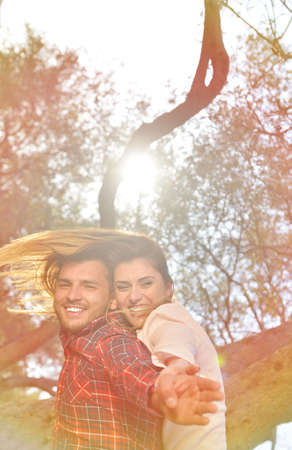 couple relax under the tree. Fine art style. Olive garden.の写真素材