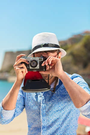 Tourists taking photo in the city at vacationの写真素材