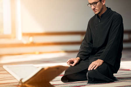Religious muslim man praying inside the mosqueの写真素材