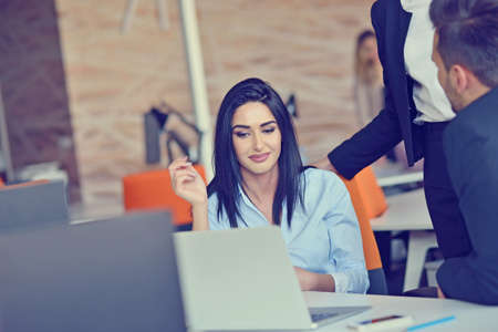 Woman working at computer in an office