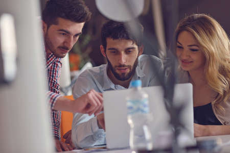 Group Young Coworkers Making Great Business Decisions.Creative Team Discussion Corporate Work...