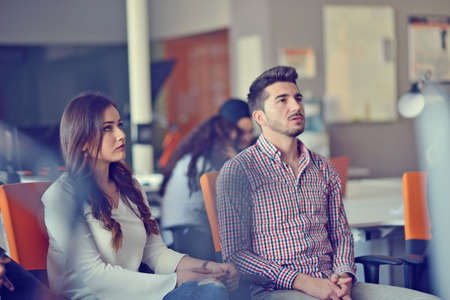 Group Young Coworkers Making Great Business Decisions.Creative Team Discussion Corporate Work Concept Modern Office.の写真素材