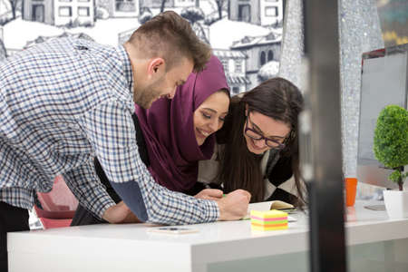 young creative startup business people on meeting at modern office making plans and projects