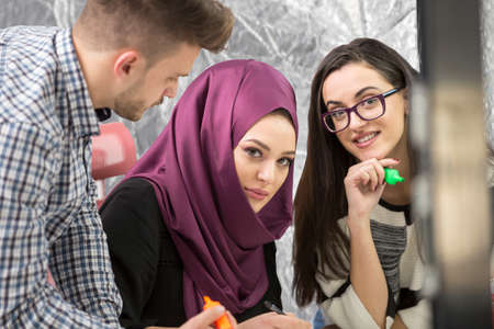 young creative startup business people on meeting at modern office making plans and projects