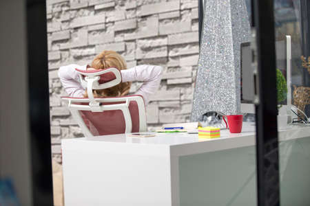 Tired Neck. Young office worker Woman Suffering From Neck Pain.の写真素材