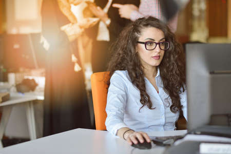Woman entrepreneur busy with her work in office.