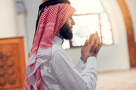 Religious muslim man praying inside the mosqueの写真素材