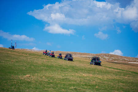 man riding atv vehicle on off road track ,people outdoor sport activitiies theme